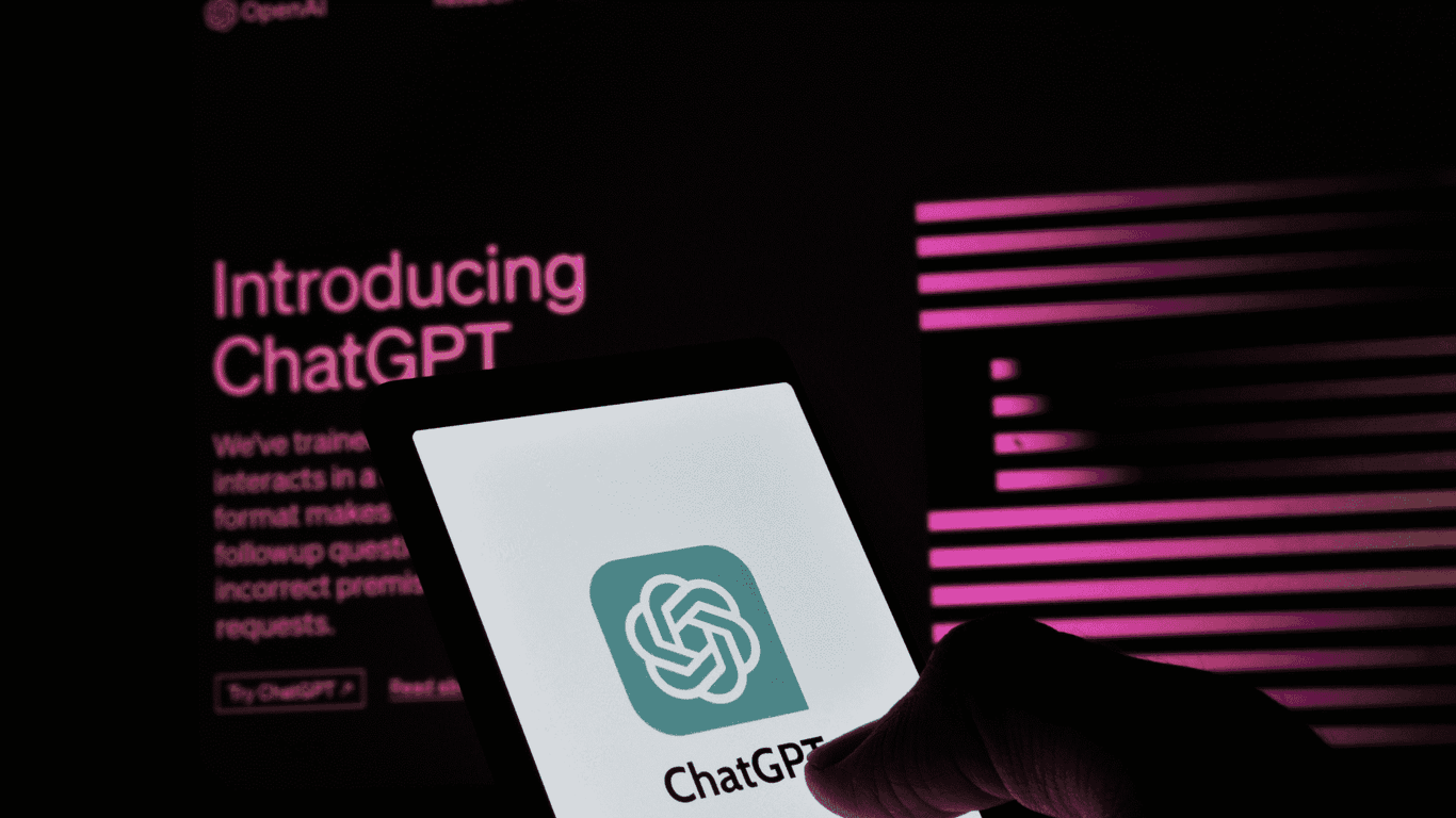 smartphone in hand of a person, chat gpt logo on screen