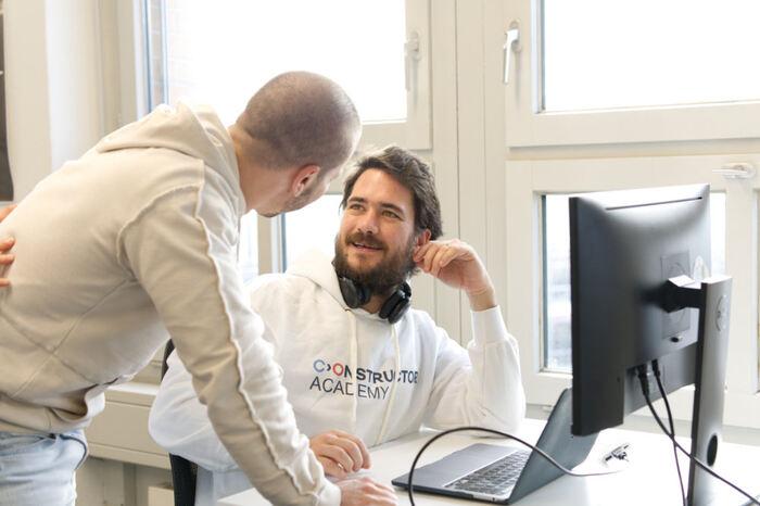 Students talking to each other in a classroom